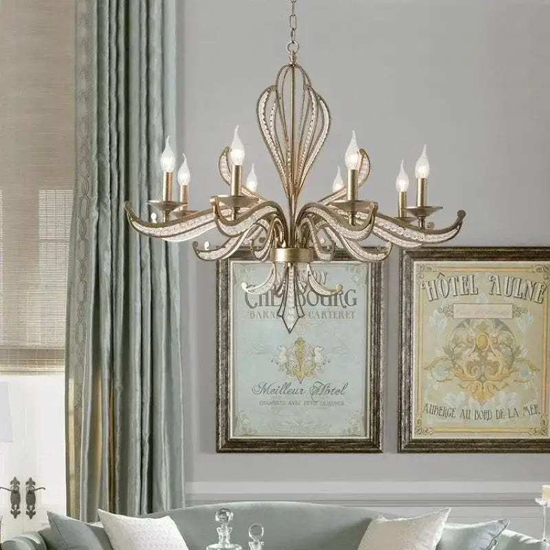 Antique brass french candle pendant lighting with intricate leaf arms and crystal accents by decorbites french candle