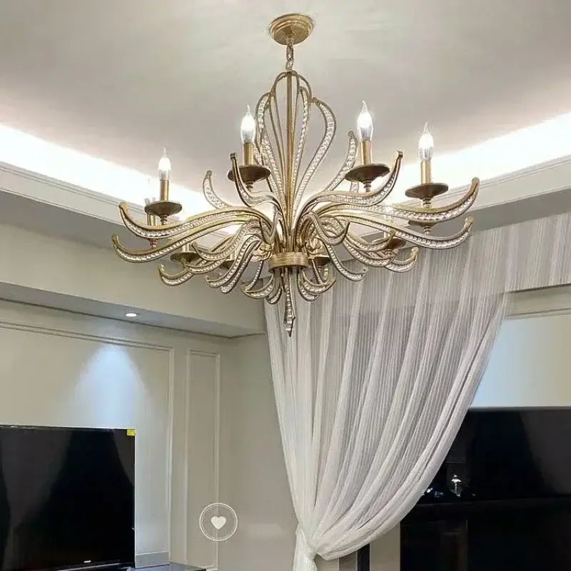 Antique brass french candle design pendant lighting featuring gold-toned leaf arms with crystal accents for dining room decorbites french candle
