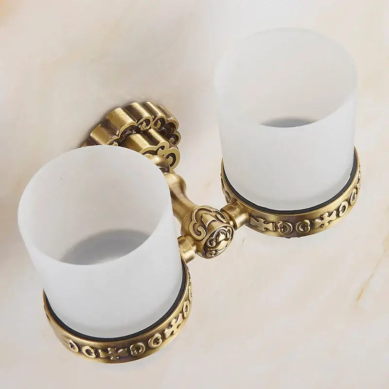 Antique brass double toothbrush holder with frosted white glass cups and ornate scrollwork in brass antique glass decorbites style