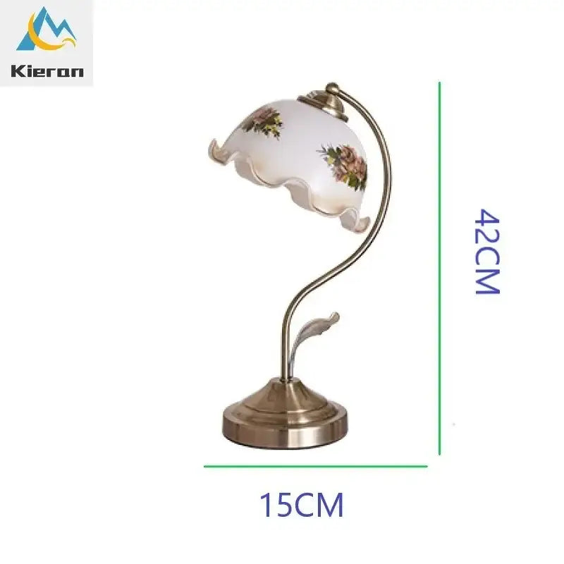 Antique brass glass flower led desk lamp with white scalloped glass flower shade and curved brass base for bedroom use