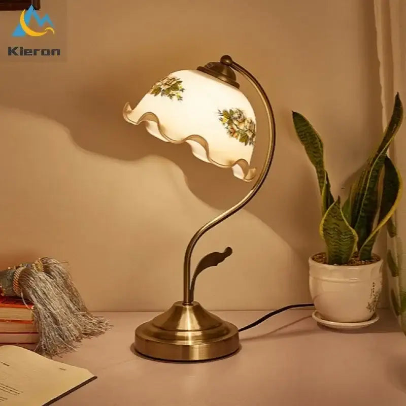 Antique brass glass flower led desk lamp with scalloped off-white glass shade and green yellow floral patterns