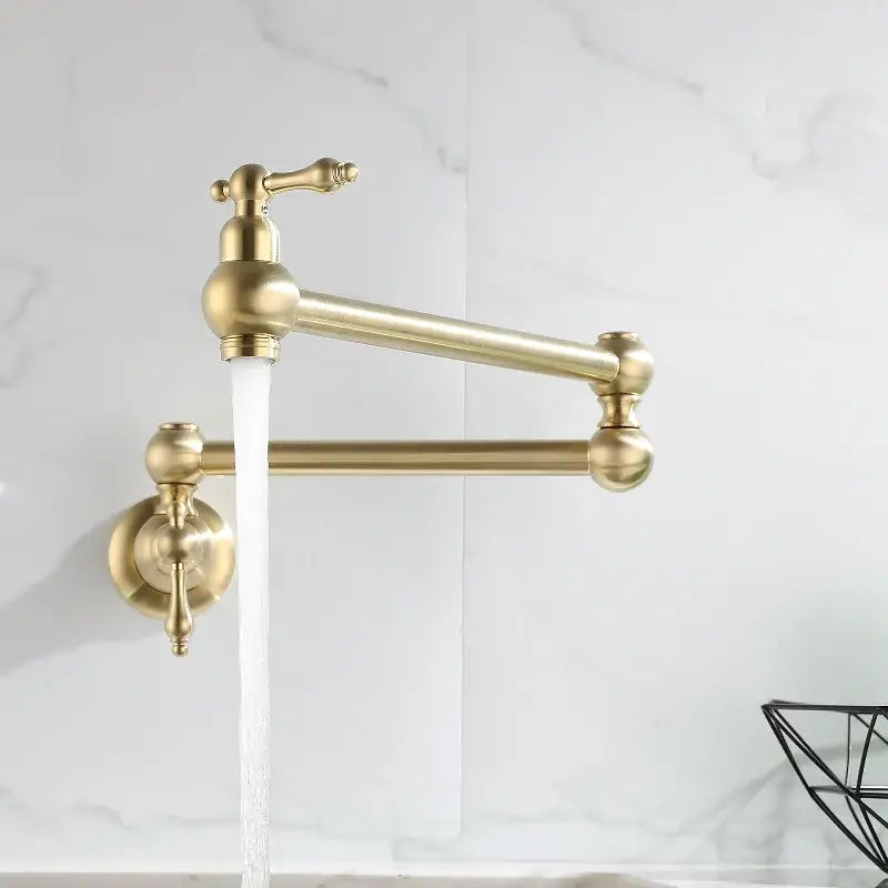 Antique brass gooseneck pot filler tap with brass finish and ornate handles wall mounted kitchen filler tap