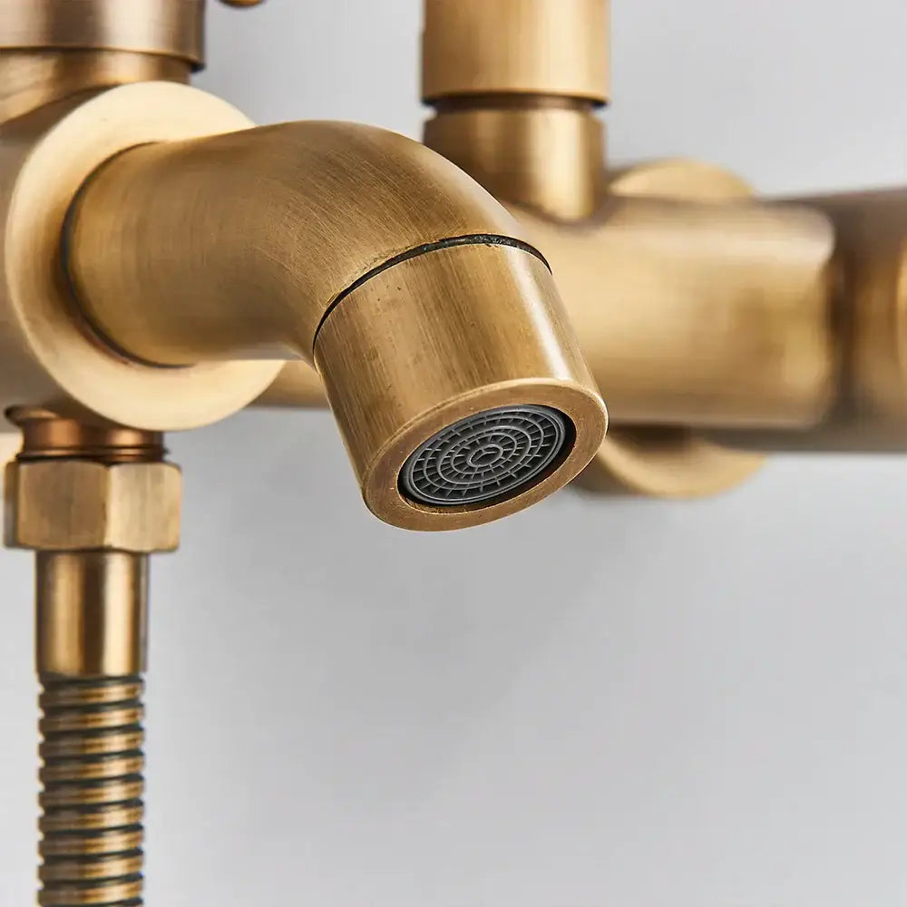 Antique brass decorbites brass handheld rainfall shower system with curved spout and textured circular brass handheld rainfall spray head