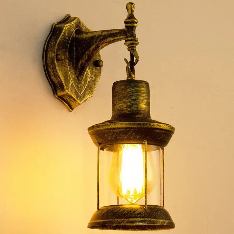 Antique brass industrial glass wall lamp with clear glass enclosure and exposed filament bulb for bedroom decorbites industrial glass wall