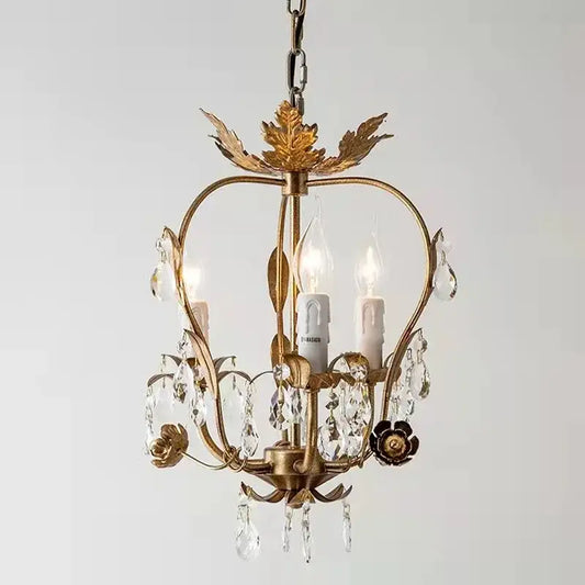Antique brass iron crystal chandelier with leaf details clear crystal droplets and candle style bulbs for bedroom decorbites iron crystal
