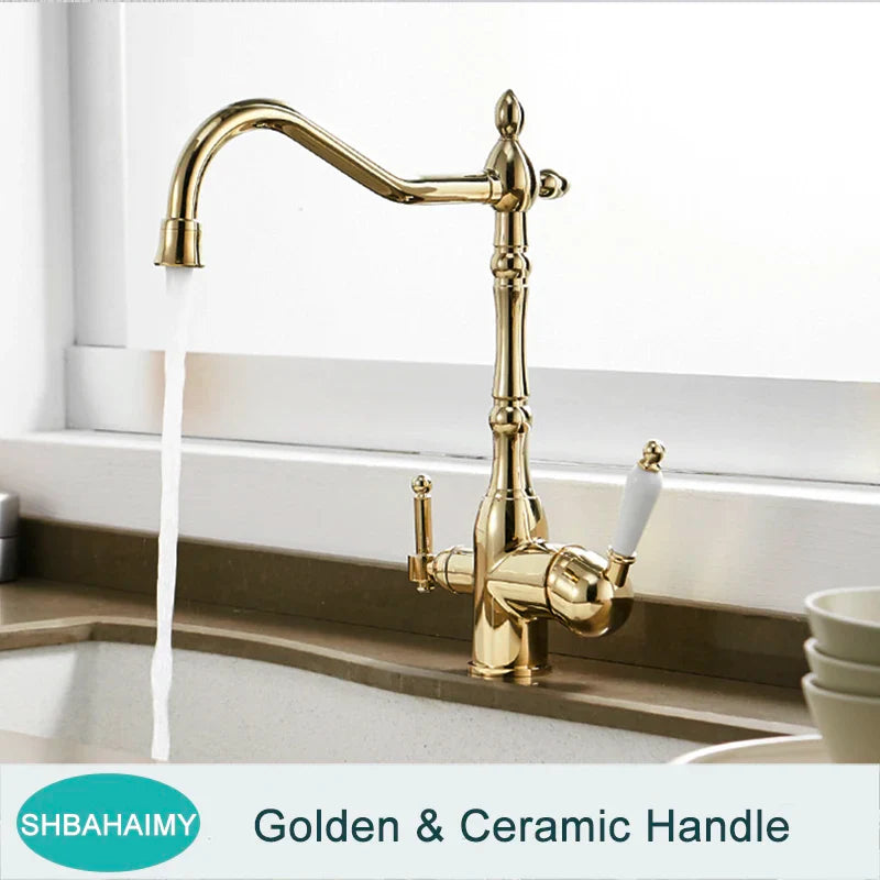 Antique brass kitchen faucet with polished gold finish, elegant curved spout, and ceramic dual handles for temperature control