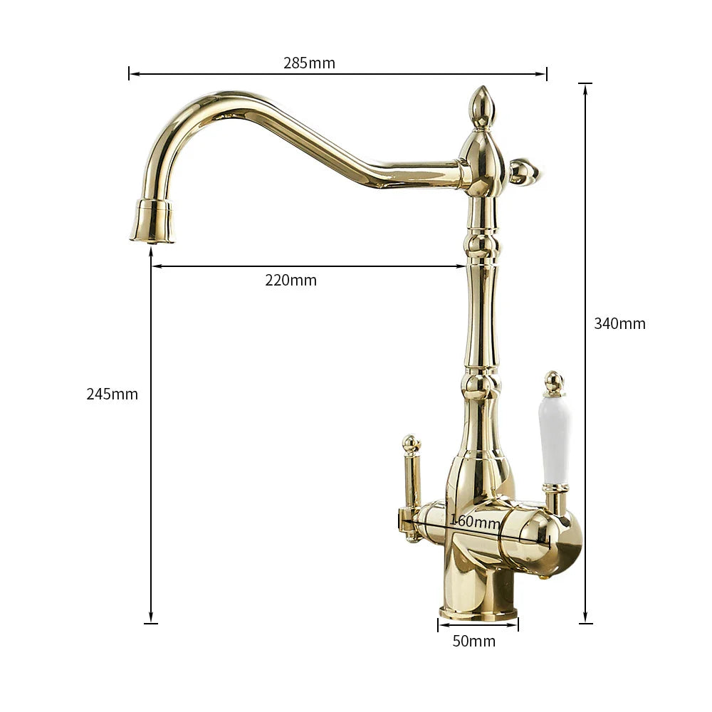 Antique brass kitchen faucet with dual handles including one ornate handle with a white ceramic knob and curved spout