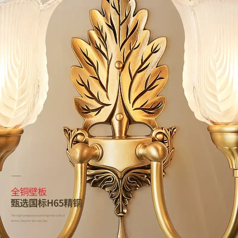 Gold-colored antique brass wall lamp with ornate leaf tulip design and frosted glass shades for bedroom decorbites brass wall lamp