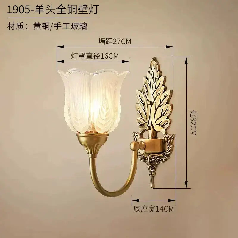 Antique brass leaf tulip wall lamp with a vintage-style brass wall lamp and textured glass shade for bedroom decor