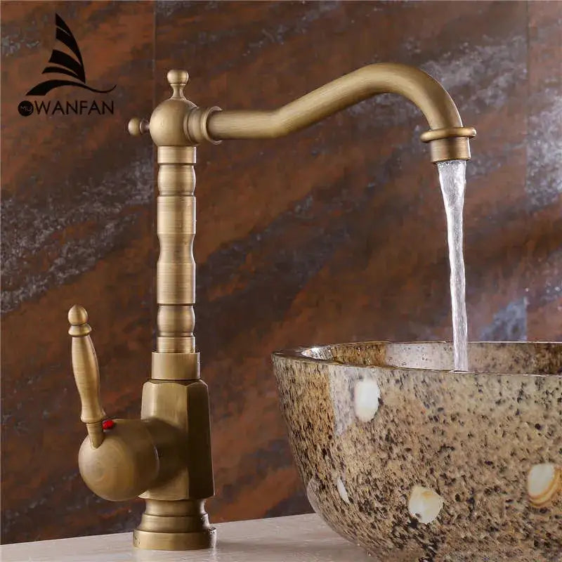 Antique brass ornate decorbites basin sink faucet with curved spout and vintage-style handle for bathroom use