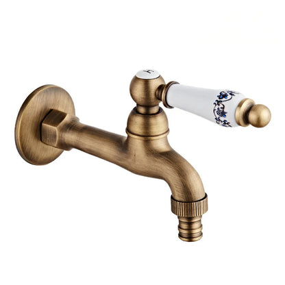 Antique brass outdoor faucet with single hole ceramic handle featuring blue floral patterns in durable housing material