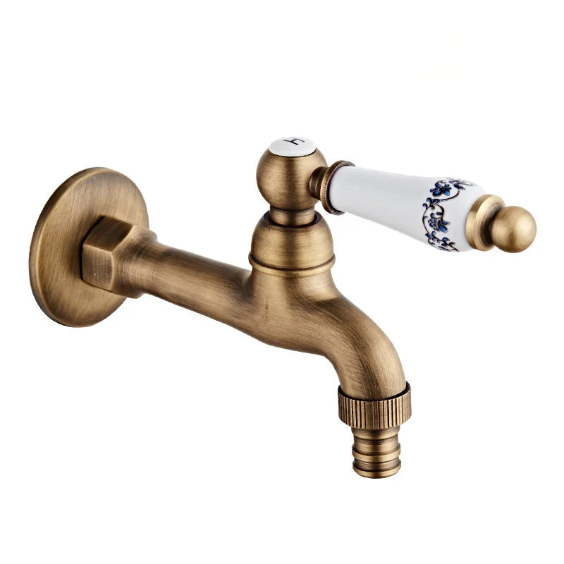 Antique brass outdoor faucet with single hole ceramic handle featuring blue floral patterns in durable housing material