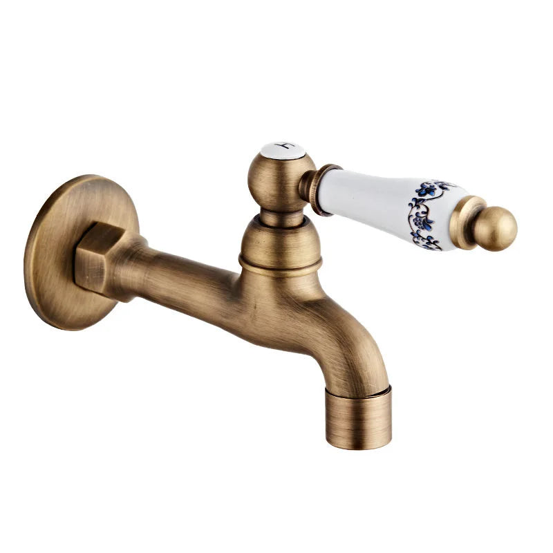 Antique brass outdoor faucet with single hole, white ceramic handle with blue floral patterns, durable housing material
