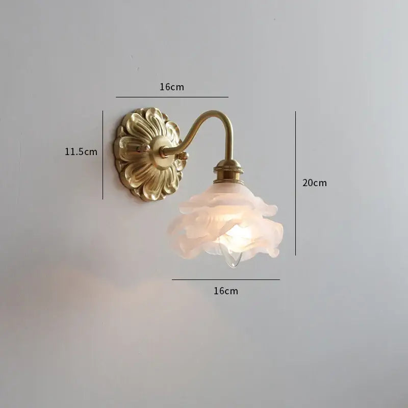 Antique brass wall lamp with frosted glass pink rose shade by decorbites for elegant bedroom sconce decor