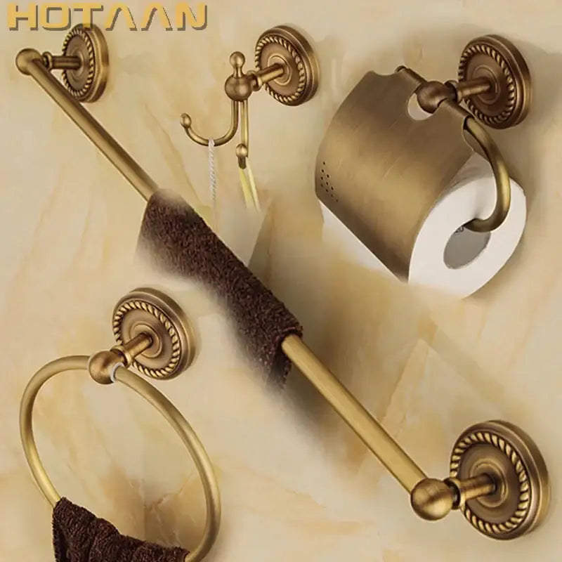 Antique brass rope twist 4 piece bathroom set with ornate circular wall mounts for decorative bathroom use