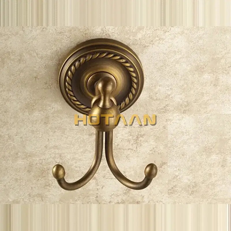 Antique brass rope wall hooks featuring double hook design with rope-twist detailing for bathroom decorbites brass wall use