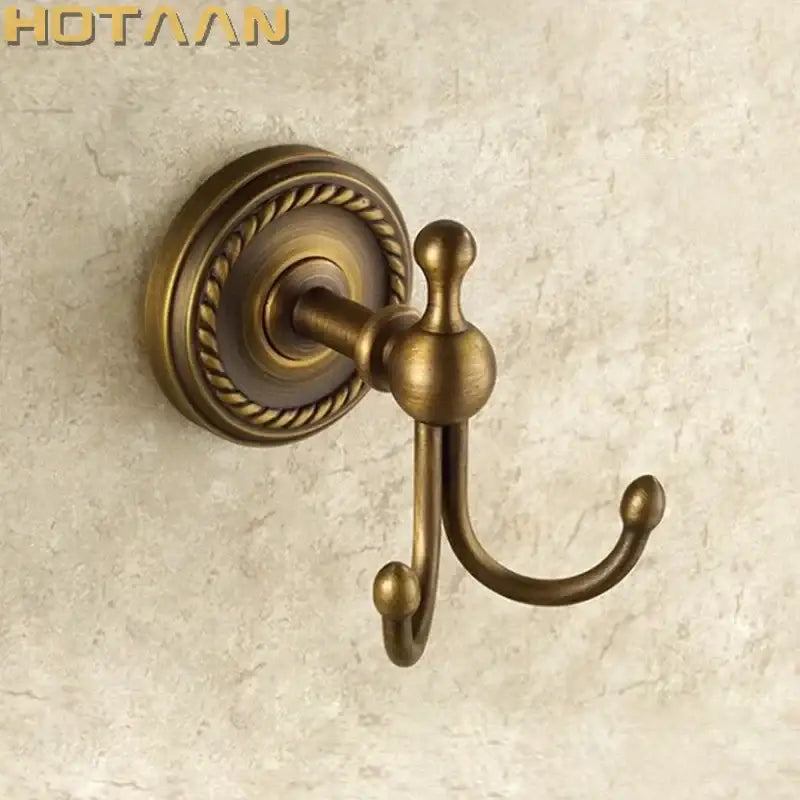 Antique brass rope wall hooks with double hook design and decorative border for bathroom decorbites brass wall hooks