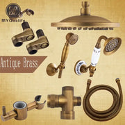 Antique brass shower faucet set with round rainhead handheld sprayer and decorative ceramic handle for bathroom use