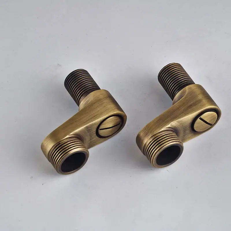 Antique brass round shower faucet set featuring l-shaped plumbing fittings with threaded ends for bathroom use