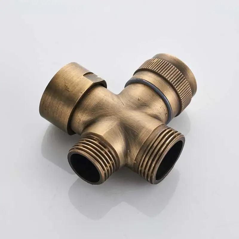 Antique brass three-way plumbing tee with knurled cap and threaded connections for shower faucet set installation