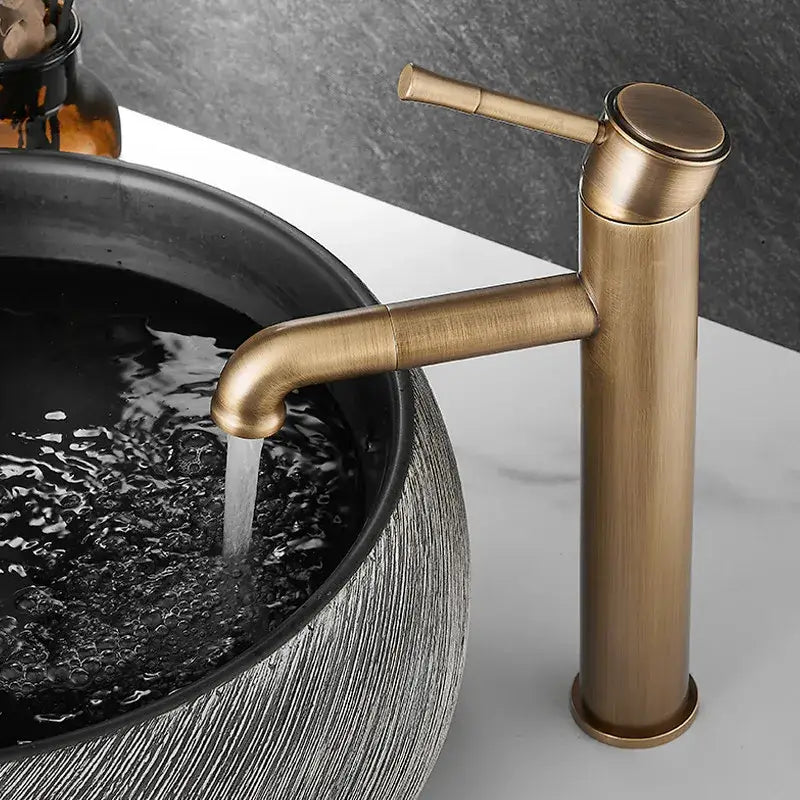 Antique brass single handle bronze basin faucet with brass finish and sleek cylindrical design for bathroom decorbites bronze basin