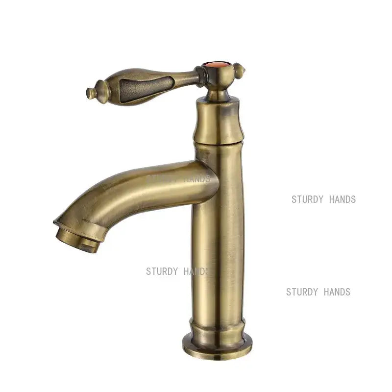 Antique brass single-handle bathroom faucet with classic ornate design and slightly curved spout for bathroom sink fixture