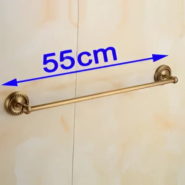 Antique brass single towel bar with ornate base and decorative end caps for elegant bathroom decor