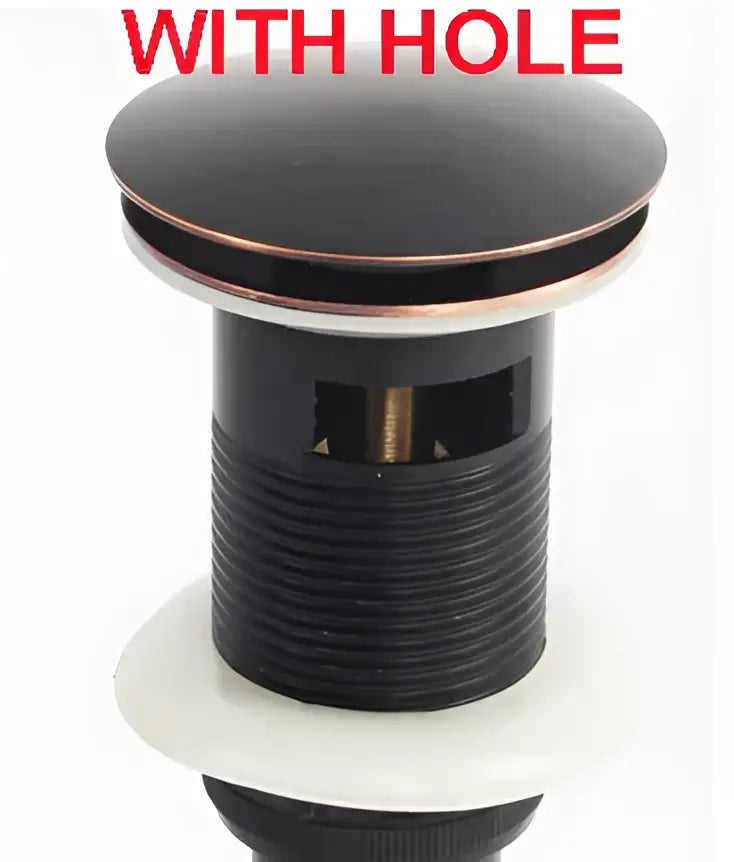 Antique brass sink drain with white rubber seal and ribbed black and copper-toned stopper by decorbites brass pop
