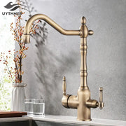 Antique brass vintage kitchen water filter faucet with dual spout and ornate turned spout design with dual handles