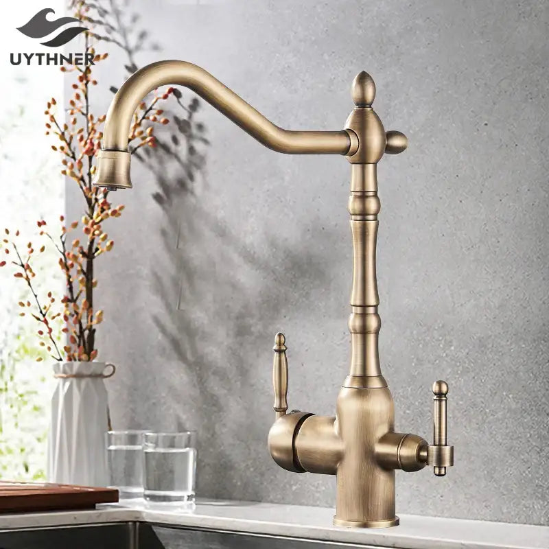 Antique brass vintage kitchen water filter faucet with dual spout and ornate turned spout design with dual handles