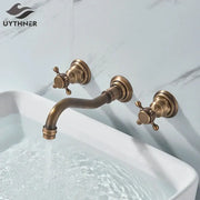 Antique brass wall mounted black basin faucet with two cross-handle knobs and curved spout for decorbites black basin faucet