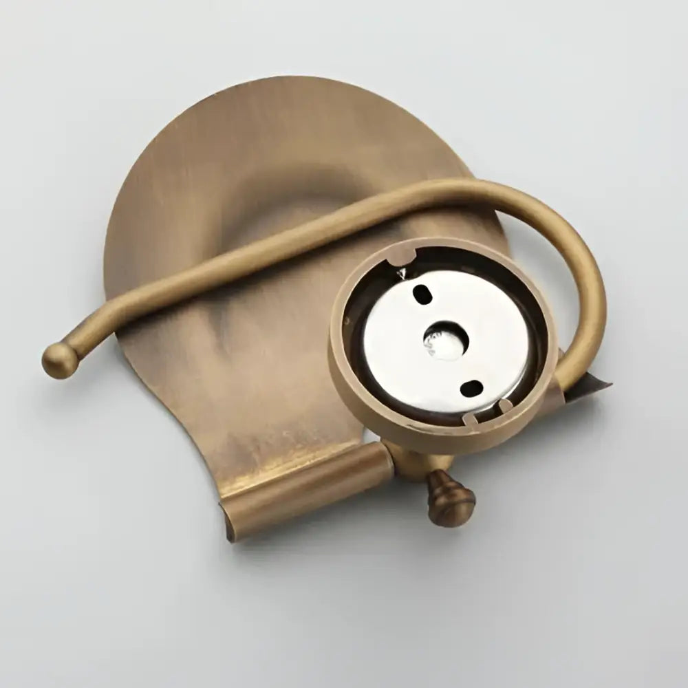 Antique brass wall mounted paper holder with curved arm and ceramic base for bathroom decorbites brass wall use