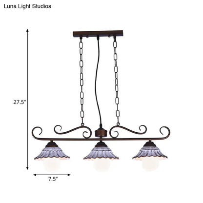 Antique bronze wrought iron island pendant lamp with three frosted glass shades and ruffled edges by decorbites
