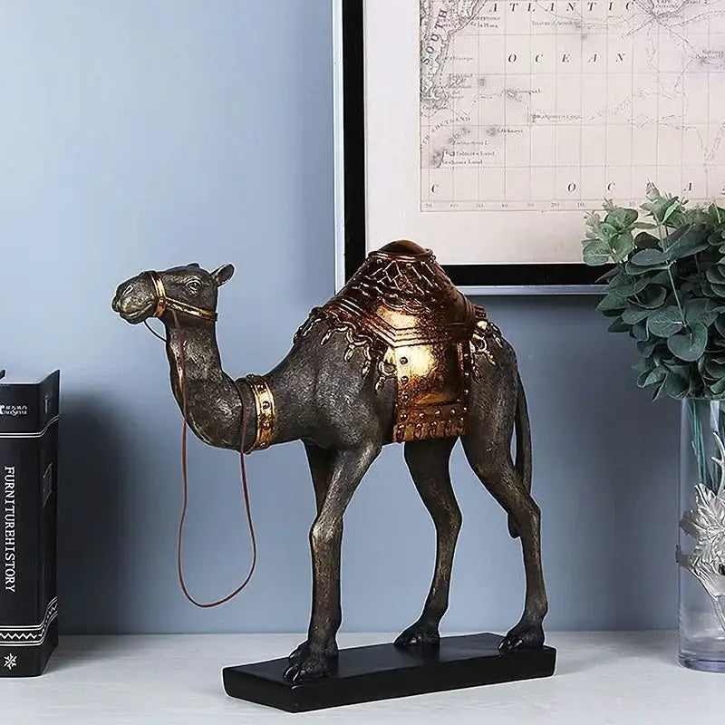 Bronze-colored camel dromedary indian style figurine with gold embossed saddle on black base for living room decorbites decor