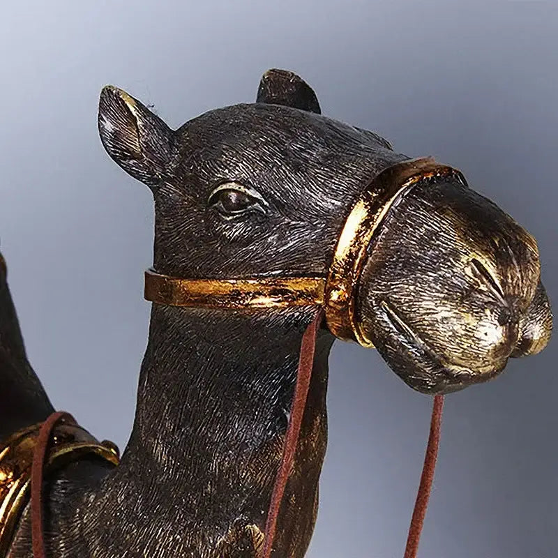 Antique bronze and gold decorbites camel dromedary sculpture with detailed facial features for living room decor