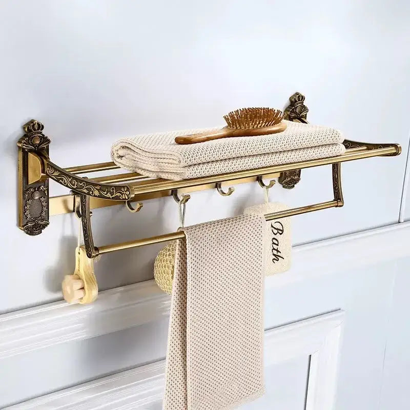 Antique brass-finished bathroom towel rack with ornate scrollwork and multiple hooks in decorbites bronze carved bath set