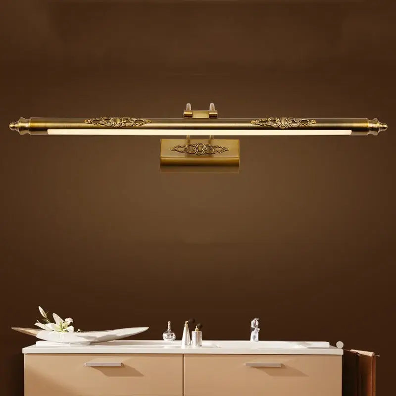 Antique bronze carved mirror lamp bathroom scrollwork wall light with gold-toned ornate bar light and floral detailing