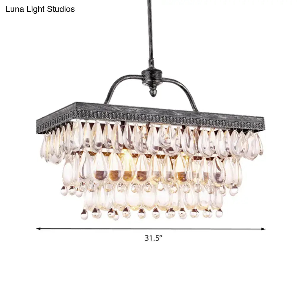Antique bronze clear crystal rectangular chandelier with dark distressed metal frame and teardrop crystals for dining room light