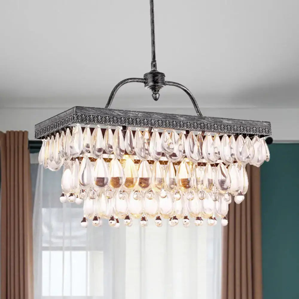Antique bronze clear crystal rectangular chandelier with dark metal frame and cascading teardrop clear crystals for dining room
