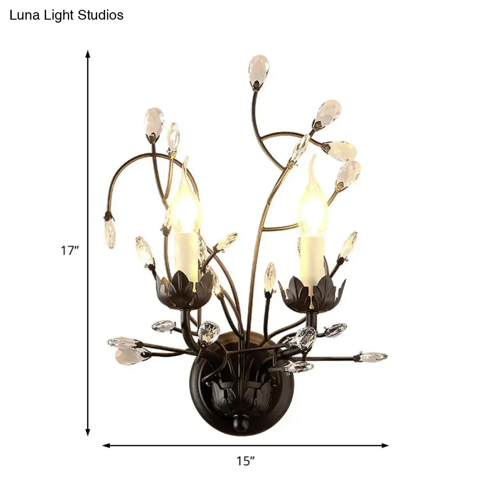 Antique bronze wall light with two e12 e14 candle-style lights and crystal accents shaped like blossoms for living room