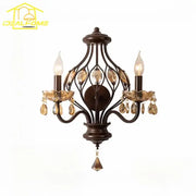 Antique bronze wall lamp with three crystal candle arms featuring amber droplets for living room decorbites crystal candle
