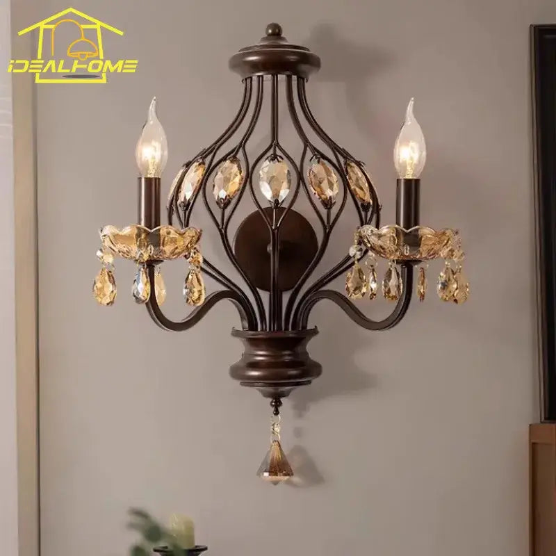 Antique bronze wrought iron wall lamp with amber and teardrop crystal candle accents for living room decorbites crystal candle
