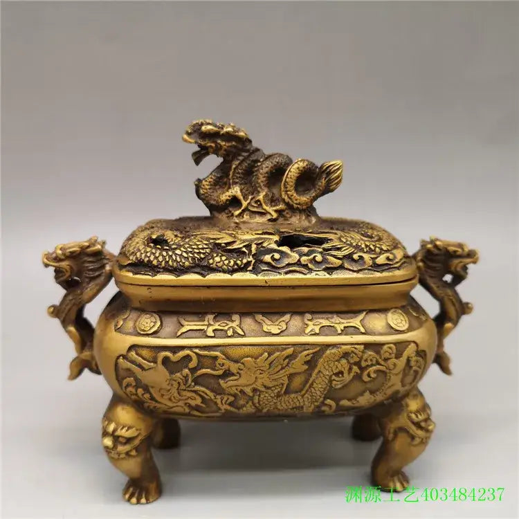 Golden brass incense burner with double dragon lion motifs and lion-shaped feet for living room ornament