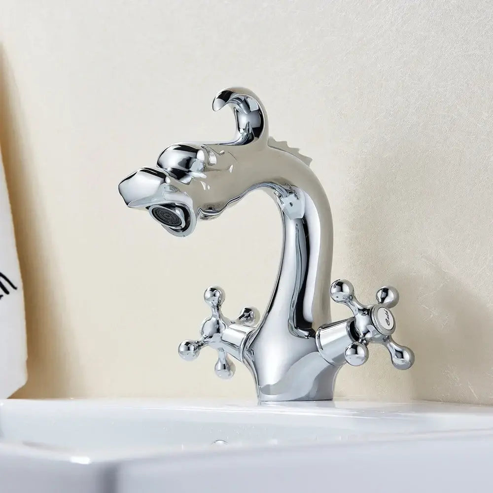 Chrome finished basin faucet with ornate dragon-themed cross handles by decorbites for bathroom vessel sinks