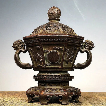 Antique bronze incense burner set featuring intricate dragon and cloud motifs with lion-head handles and domed lid