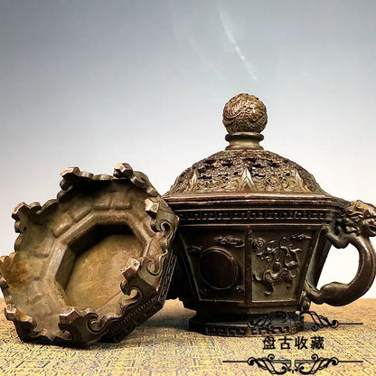 Antique bronze incense burner set with intricate dragon carvings and decorative spherical finial for living room decor