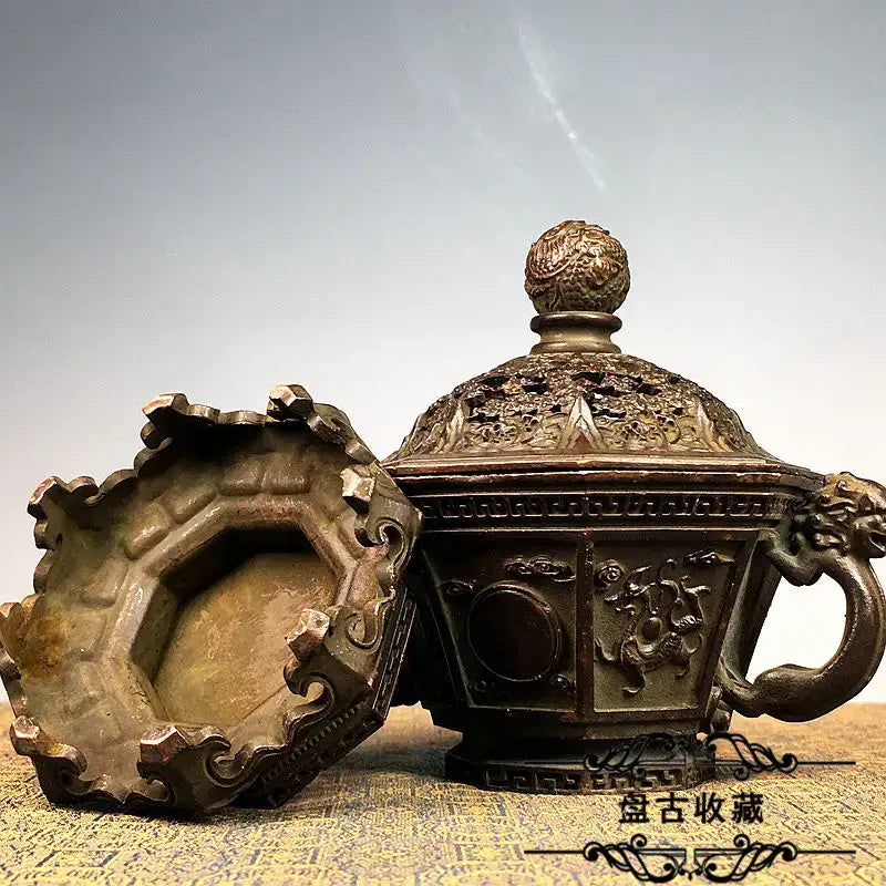 Antique bronze incense burner set with intricate dragon carvings and decorative spherical finial for living room decor
