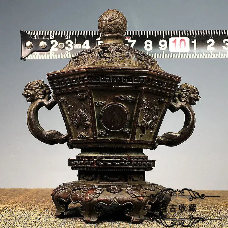 Antique bronze dragon incense burner set with hexagonal body and intricate carvings for living room decor