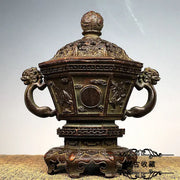 Antique bronze incense burner set with intricate dragon and cloud motifs, lion-head handles, and detailed domed lid for living room decor