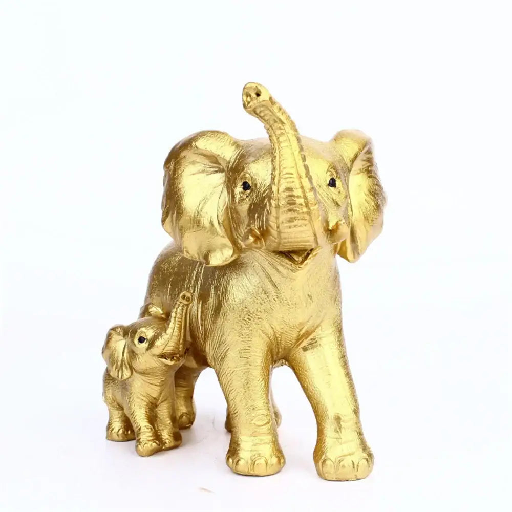 Golden resin elephant family figurine with textured skin and black bead eyes, perfect for living room décor